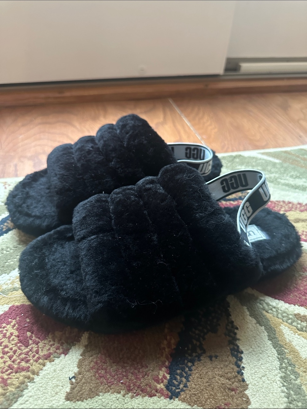 UGG Black Fuzzy Slide Sandals with Branded Heel Strap